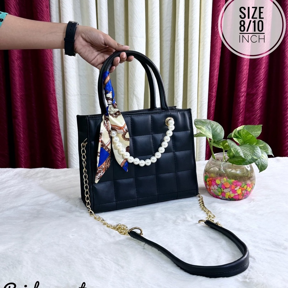 Elegant Black Handbag with Pearl Accent